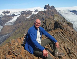 Darrick Danta sitting atop Kristinartindar Peak in Iceland in June 2012.