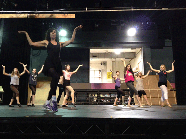 TADW students rehearse a dance for 'Disney's Aladdin Jr.' under the direction of choreographer Candy Sherwin (front). Photo by Melissa Filbeck.