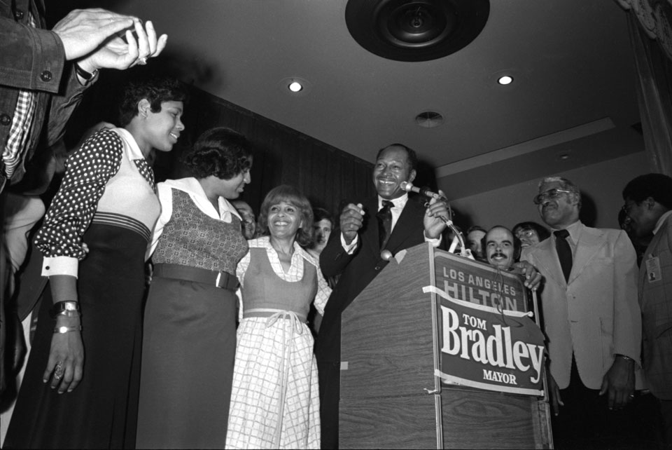 From left to right, Phyllis Bradley, Lorraine Bradley, Ethel Bradley and Tom Bradley as they celebrate the election of Tom Bradley as mayor of Los Angeles in 1973. The photo was taken by Guy R. Crowder and is part of the Tom & Ethel Bradley Center's collection at CSUN.