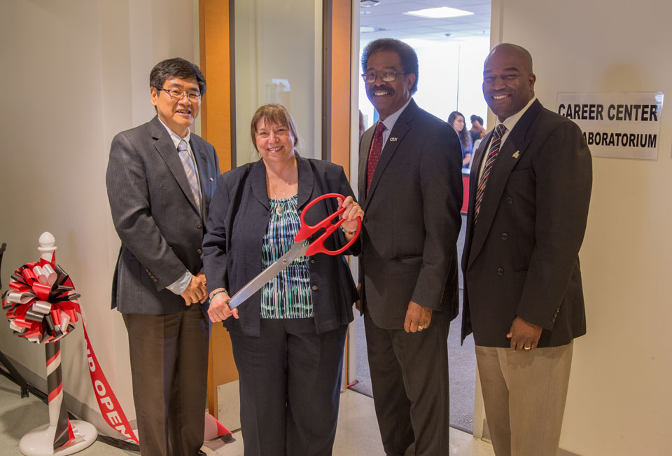 (L-R) Provost and Vice President for Academic Affairs Yi Li, Career Center Director Anne Morey, Vice President for Student Affairs and Dean of Students William Watkins, and Associate Vice President for Student Affairs Dwayne Cantrell cut the ribbon for the grand opening of the new CSUN Career Center on Oct. 20, 2015. 