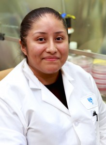 Caroline Arellano-Garcia in lab coat