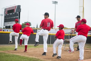 CSUN pitchers teach youth players technique. 