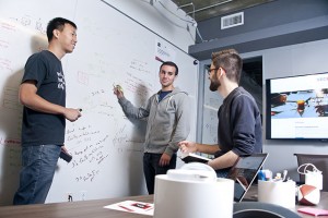 Left to right, CSUN engineering professor Bing Bing Li works with the spring 2016 University Innovation Fellows Alec Le Doux and Arman Aivazian at the META+LAB. Photo by David J. Hawkins. 