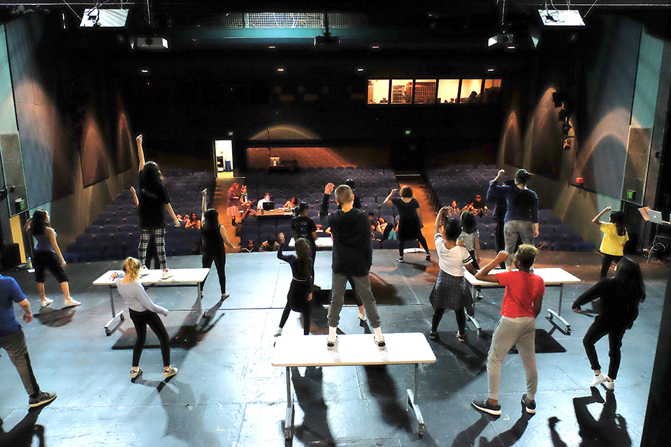 Students rehearsing a dance number for 'Freaky Friday' for choreographer Lindsay Lorenz. Photo courtesy of Teenage Drama Workshop.