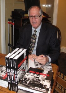 Martin M. Cooper at a book signing event. Photo courtesy of the Oviatt Library.