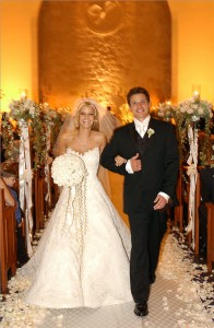 "Newlyweds" stars Jessica Simpson and Nick Lachey smile after saying "I do."