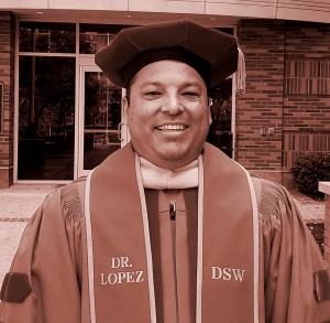 Graduation photo of alumnus Alberto Lopez, at his DSW graduation from USC.