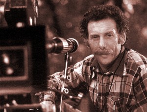 Alumnus Michael Margulies pictured with a film camera.