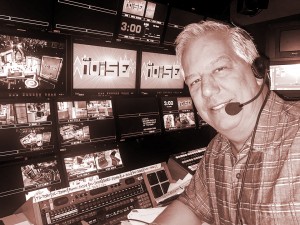Alumnus Steve Grant, pictured in a television control booth.