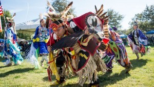 American Indian dancers in a wide array of colorful clothing celebrate native culture at the CSUN 31st annual Powwow in 2014. Photo by Lee Choo.