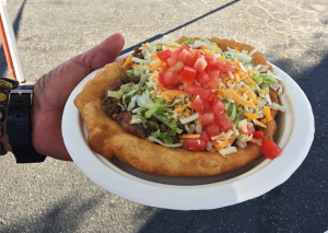An Indian taco on a plate