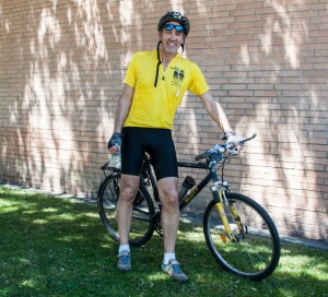 Dr. Ric Sletten, CSUN head team physician, cools off in the shade after biking 60 miles from Ventura, May 15.
