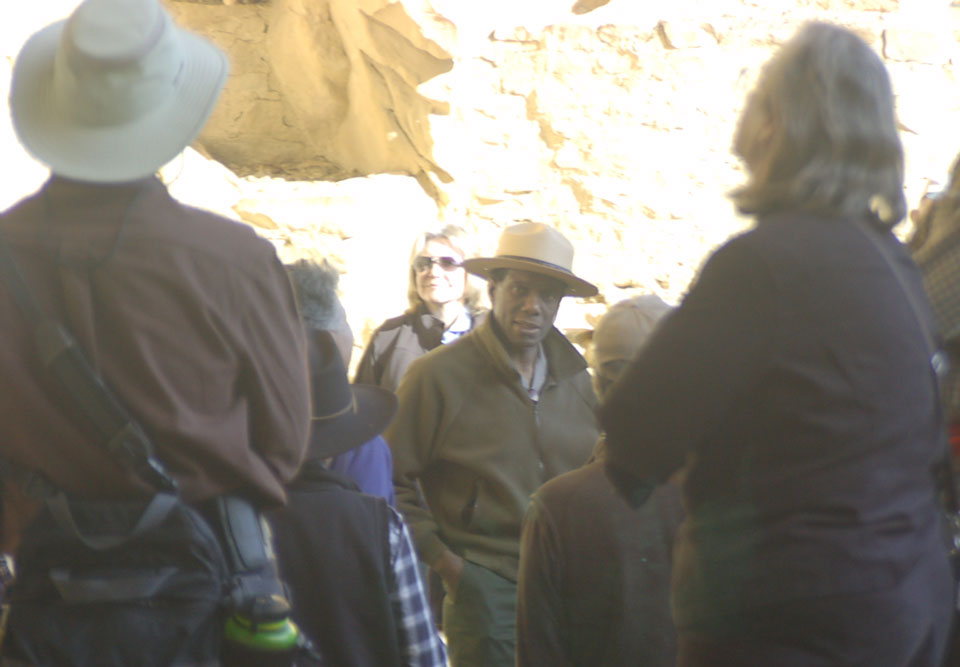 Mesa Verde National Park Superintendent and CSUN alumnus Cliff Spencer leads a group of artists on a tour of the park's ancient Native American cliff dwellings in early 2014.