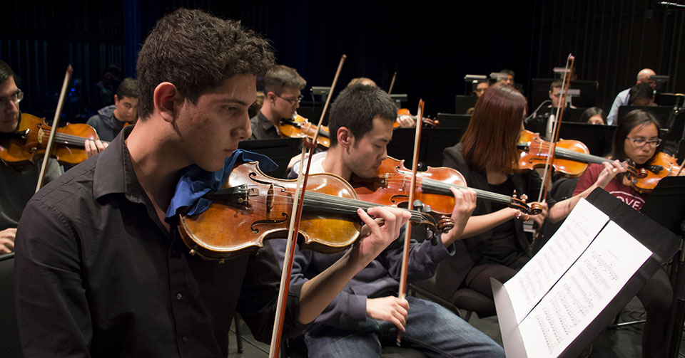 California State University, Northridge student musicians rehearse with the CSUN Symphony. Photo by Lee Choo.