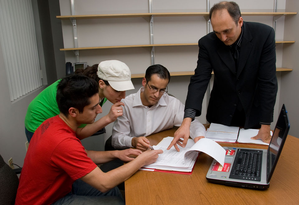 Students in CSUN's David Nazarian College of Business and Economics study federal tax procedures. Photo by Lee Choo.