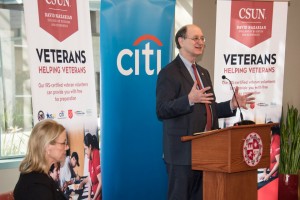 CSUN President Dianne F. Harrison looks on as Congressman Brad Sherman talks about the launch of new free tax preparation clinics for veterans. Photo by Lee Choo.