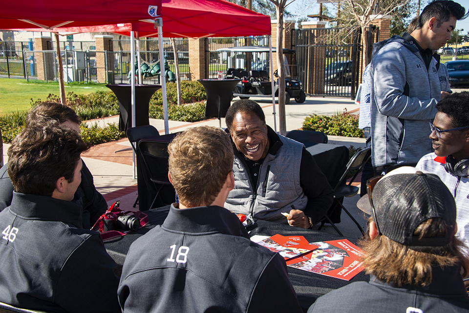 Baseball great Dave Winfield visits with members of CSUN’s baseball team as the university and Major League Baseball celebrate a $1 million grant from MLB-MLBPA Youth Development Foundation to upgrade CSUN’s baseball facilities. Photo by David J. Hawkins.