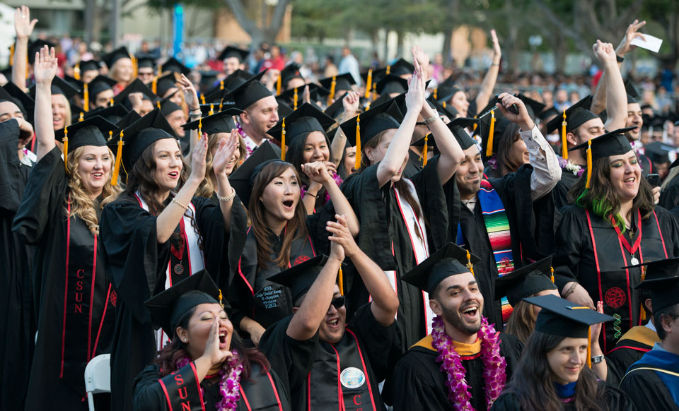 Graduates celebrating at CSUN's 2014 commencement ceremonies.