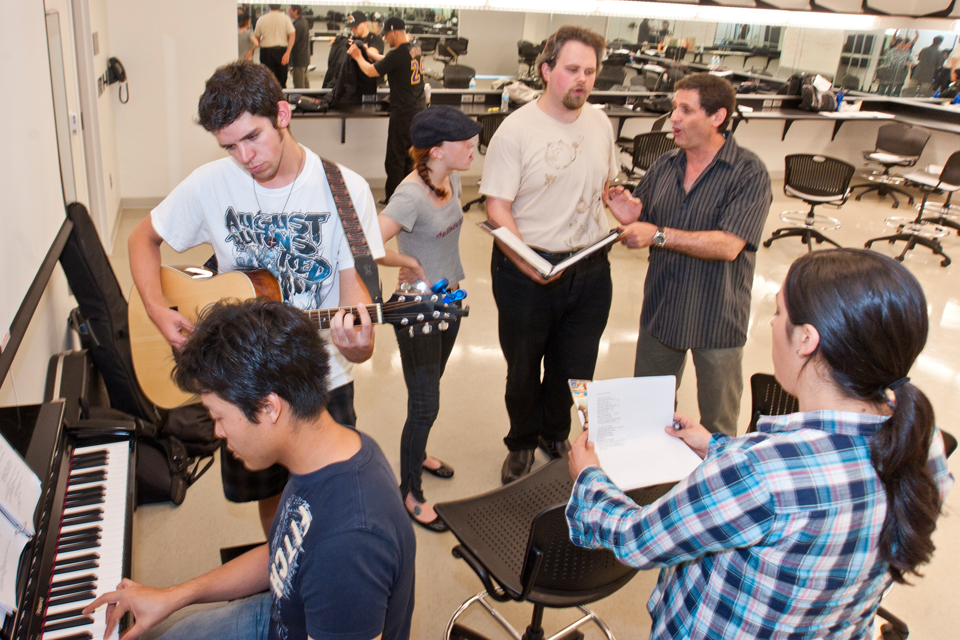 Students rehearse a song.