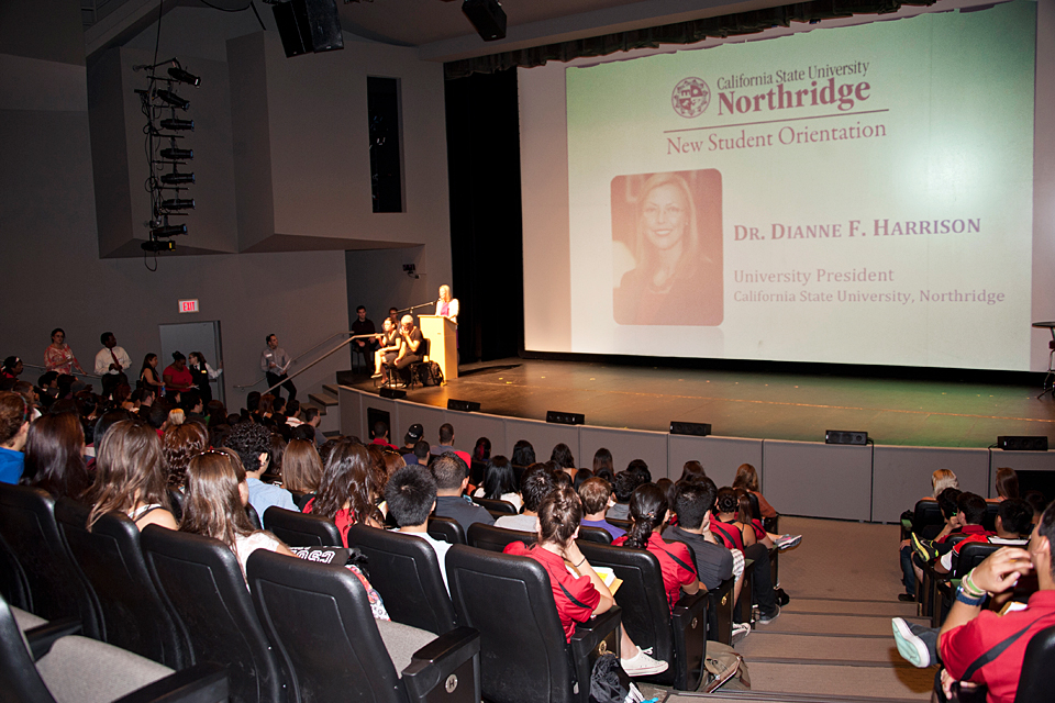 President Dianne F. Harrison welcoming new students to the university during new student orientation.