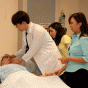 CSUN nursing students practice their skills on a 