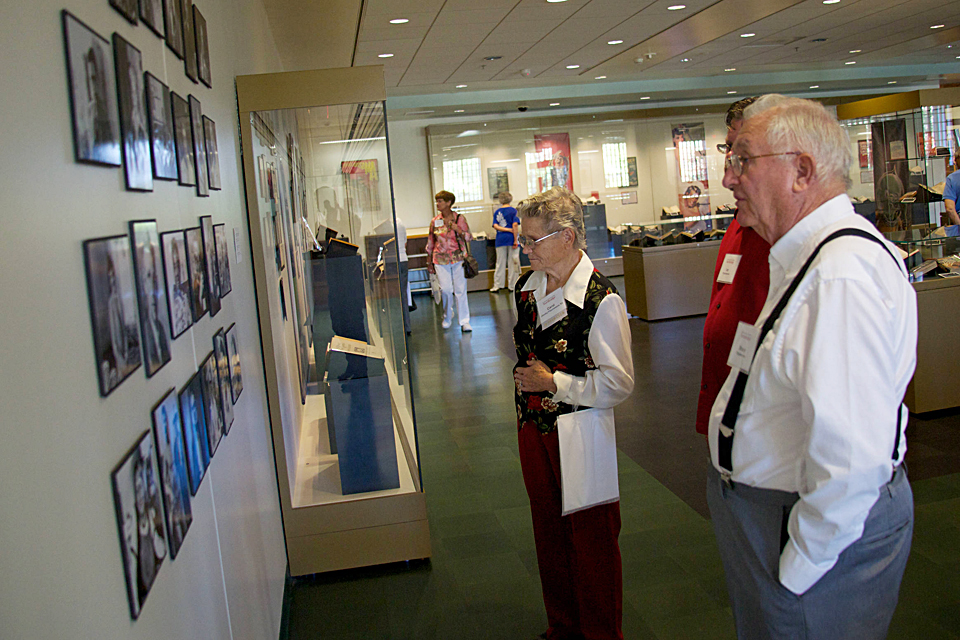 Alumni Visiting Fifty and Fabulous Exhibit in the Delmar T. Oviatt Library