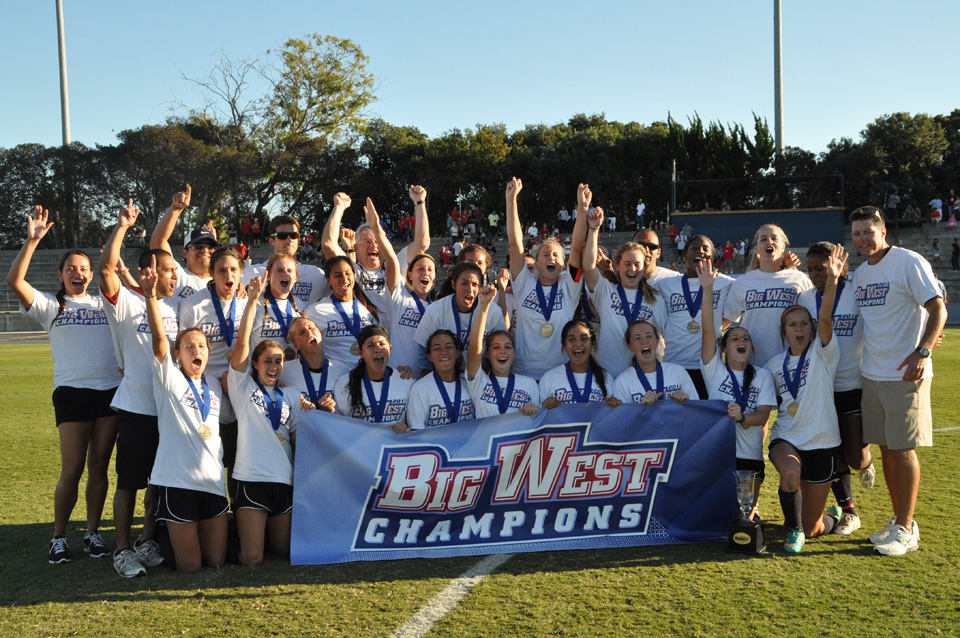 The CSUN women's soccer team celebrates their Big West league championship.