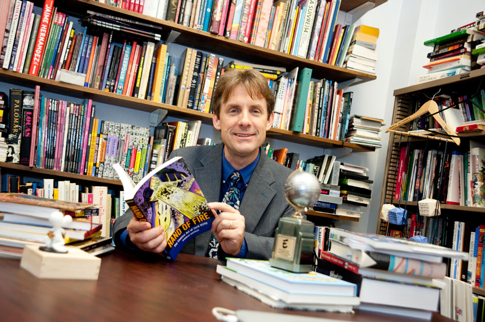 Charles Hatfield and his Eisner Award.