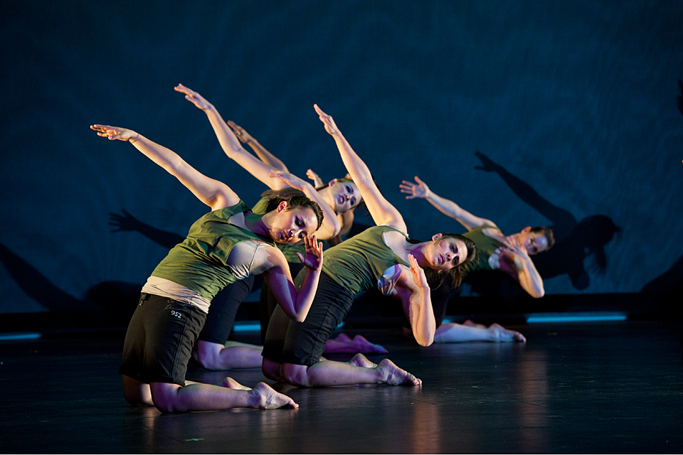 Four students performing a contemporary dance titled “Young Man” in the Plaza del Sol Performance Hall. Shown on stage from left: Alexa Nof, Michelle Short, Smile Garcia and Natalie Askren.