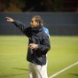 CSUN's associate head soccer coach Yossi Raz looks on from the sidelines.
