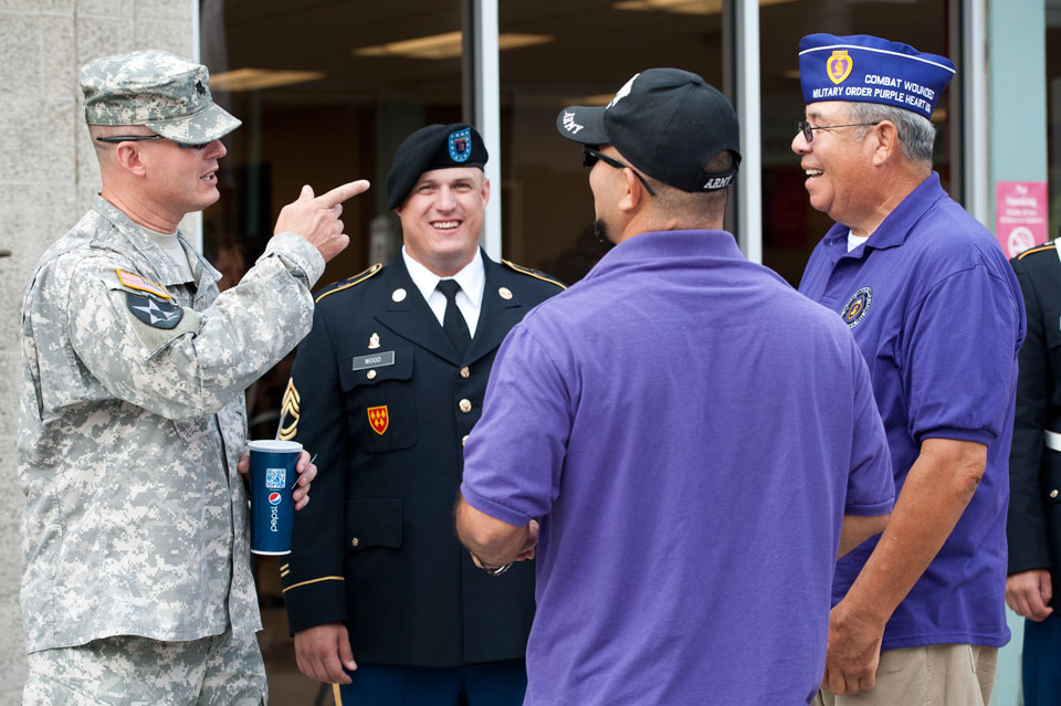 Veterans talking while celebrating the opening of CSUN’s Veterans Resource Center on Sept. 12, 2012.