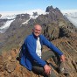 Darrick Danta sitting atop Kristinartindar Peak in Iceland in June 2012.