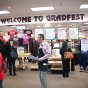 Employees and students standing in the Matador Bookstore Complex during GradFest 2013.