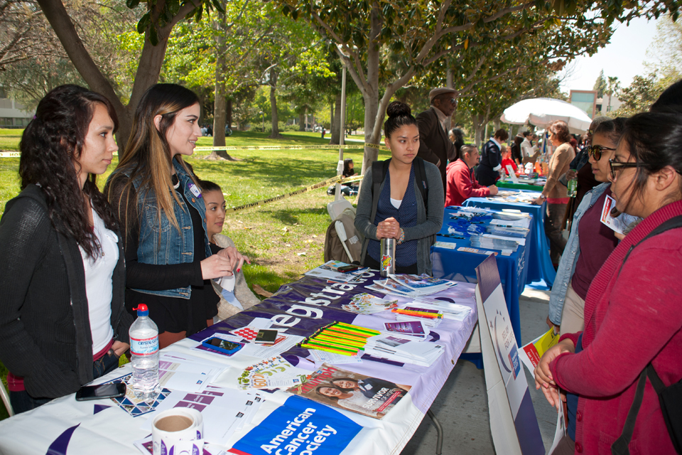Students visit American Cancer Society booth.