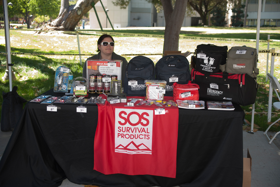The SOS Survival Products booth and their supplies.