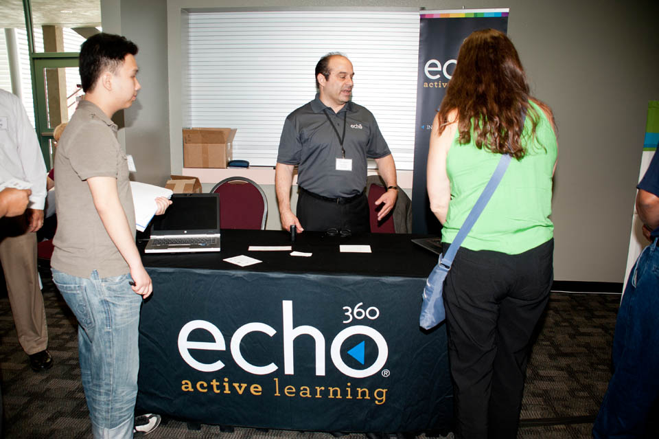 A representative for Echo360 talking to faculty and staff members
