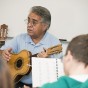 Everto Ruiz works with students
