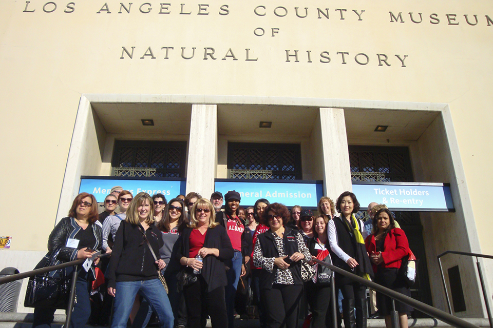 CSUN faculty on the steps of the Natural History Museum in Los Angeles.
