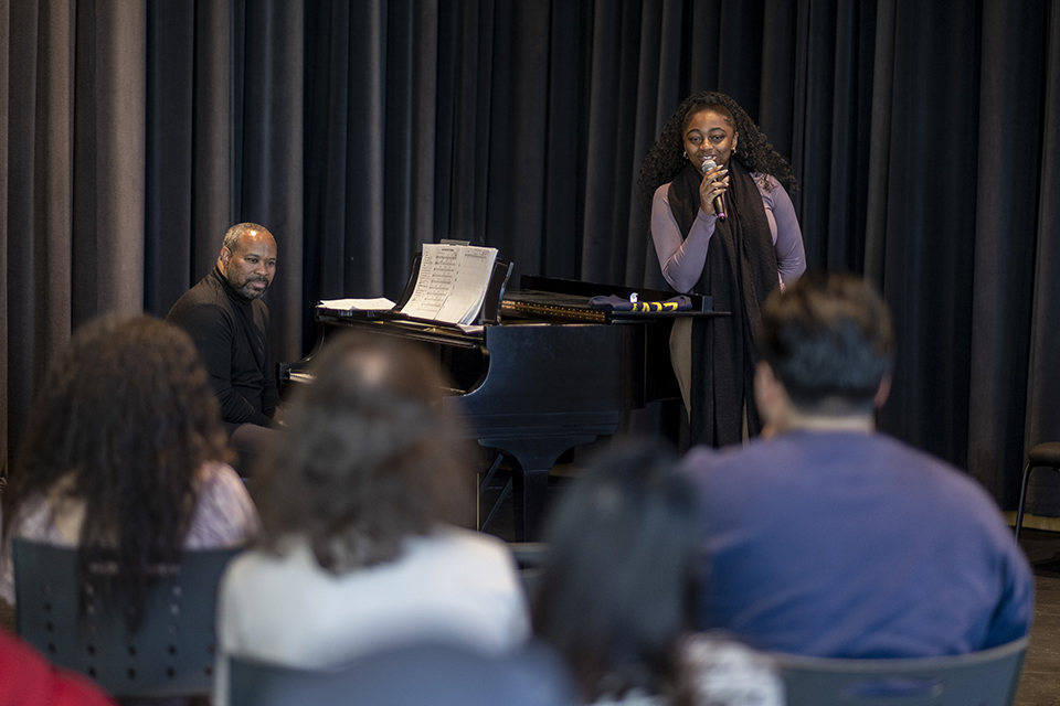Pianist Shedrick Mitchell looks on as jazz singer Samara Joy takes questions from CSUN students.