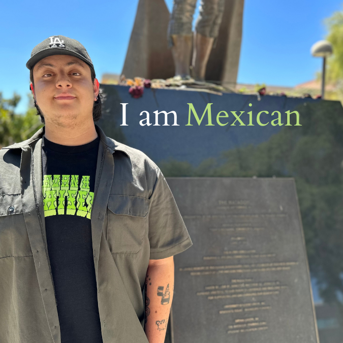 CSUN student, Samuel Torres, stands in front of the Matador statue and identifies as Mexican.