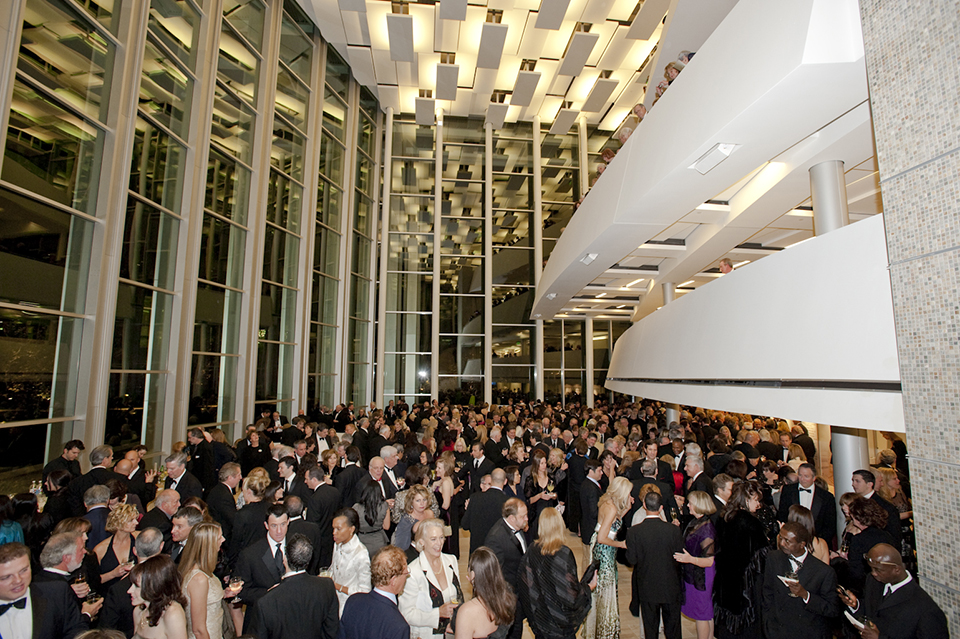 The sparkling lobby of The Soraya is packed with concertgoers in formal attire on opening night in 2011.