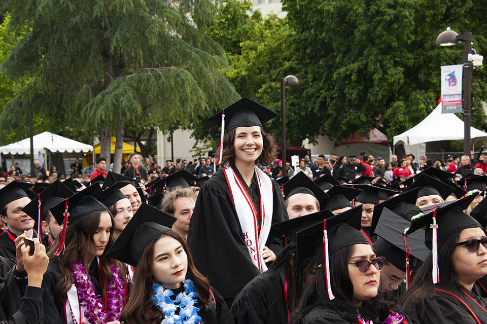 Alexandria Smolen stands to be recognized at CSUN commencement.