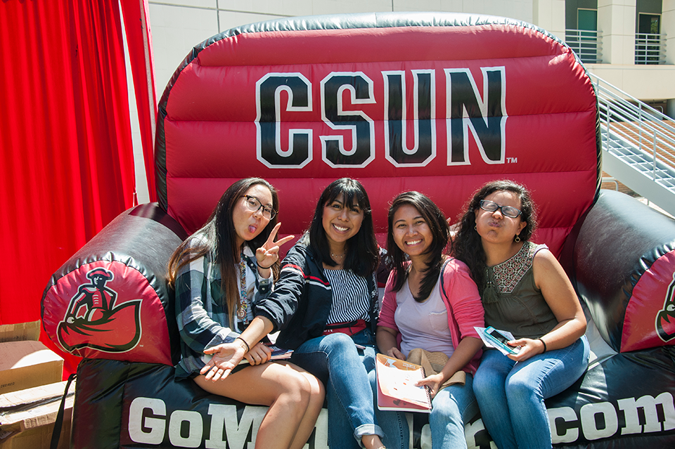 Students sitting on a Matador inflatable chair.