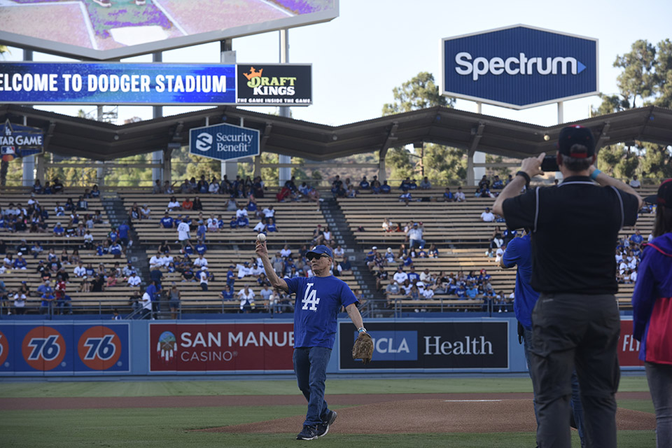 Robert Myman throws out the ceremonial first pitch at Dodger Stadium.