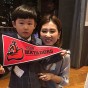 A CSUN alumna and her child take a photo at the California State University Alumni Reception in Tokyo on March 1.