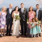 Barbara and Rick Levy (far left) celebrate their daughter's wedding in July, with their family (including their daughters, sons-in law and two granddaughters).