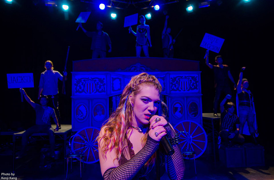 A close-up of actor Brooke Van Grinsven as she sings in CSUN's 2013 production of 