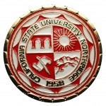 A gold "Challenge Coin" for the College of Engineering and Computer Science features the CSUN university seal.