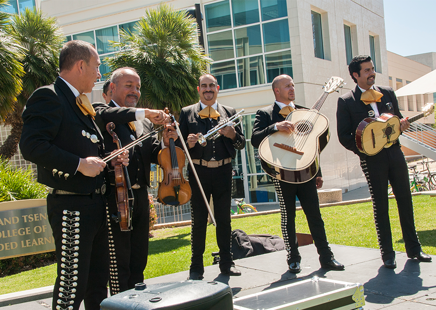 A mariachi band plays live music at the Campus Store Complex lawn during the Cesar Chavez Service Fair in 2018.