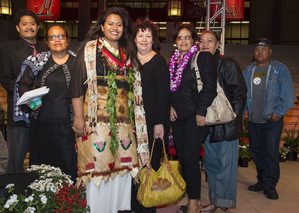 Angelina Finau in traditional Tongan wardrobe with her family at Honors Convocation in 2017.